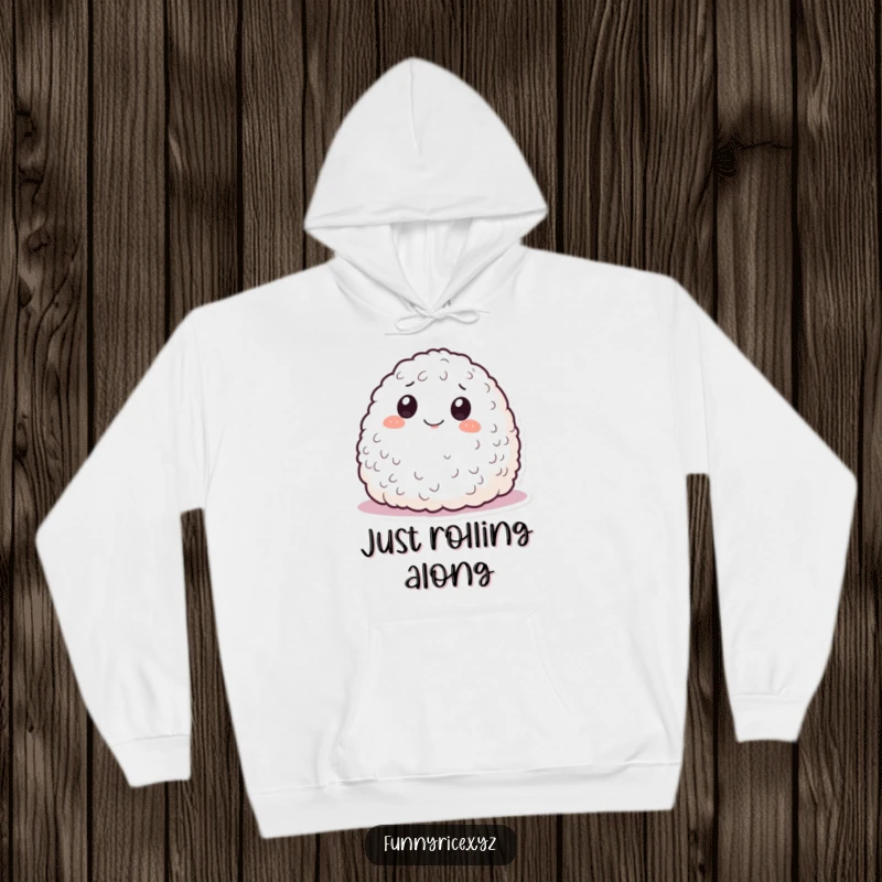 Funny hoodie with a smiling mound of rice rolling playfully, offering warmth and a sense of mischievous delight.